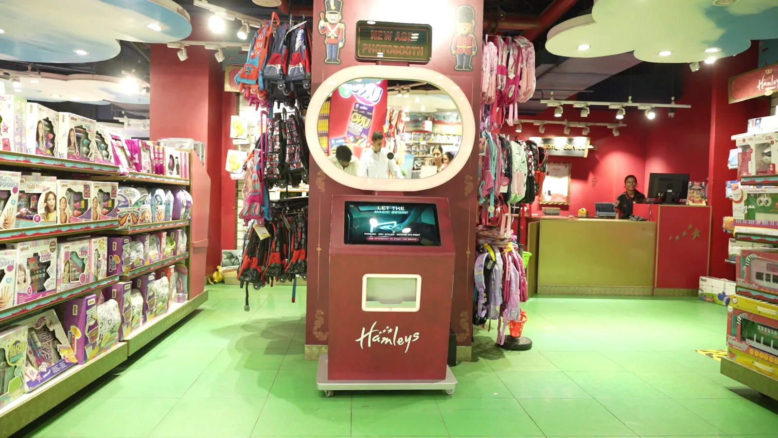 Red Pikcha photo booth standing in the toy aisle at Hamleys in Noida