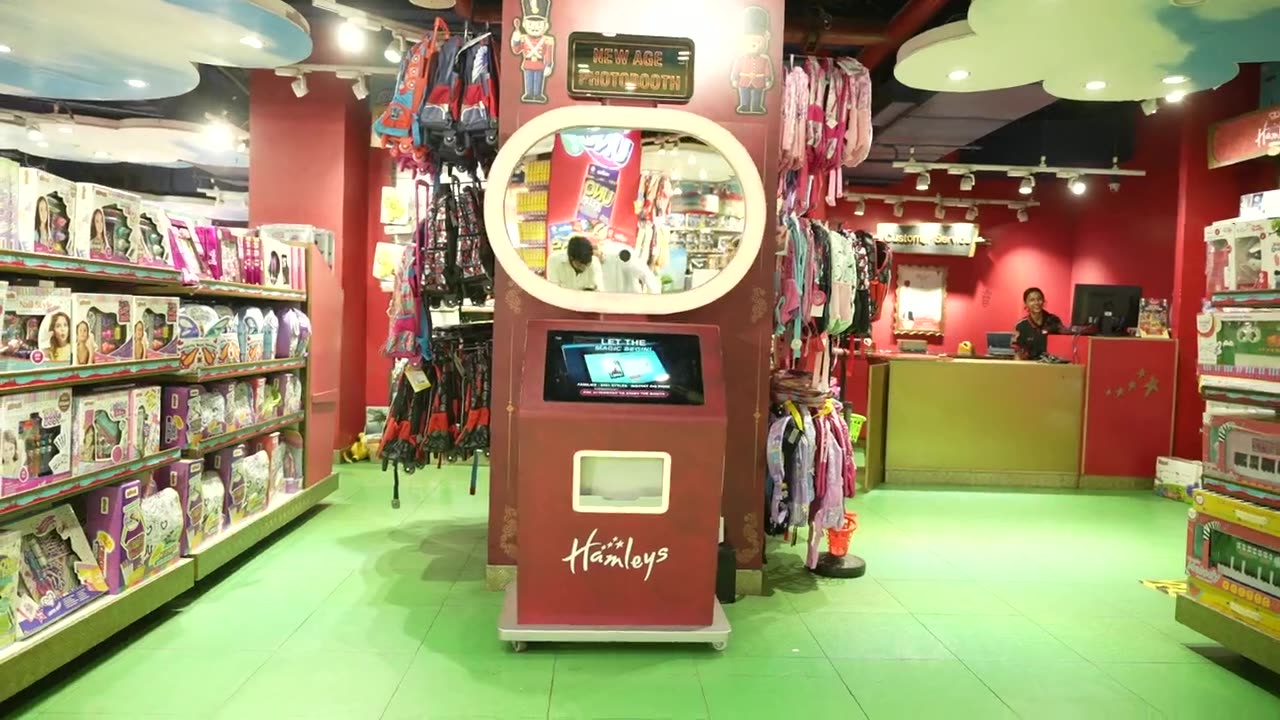 Families using the Pikcha AI Photo Booth at Hamleys