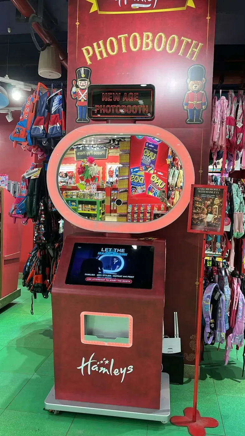 Custom red photo booth cabinet built for Hamleys